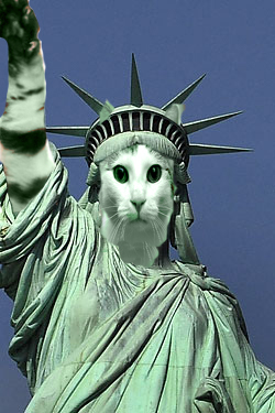 another statue of meowberty with paw